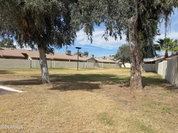 a view of lawn tennis court