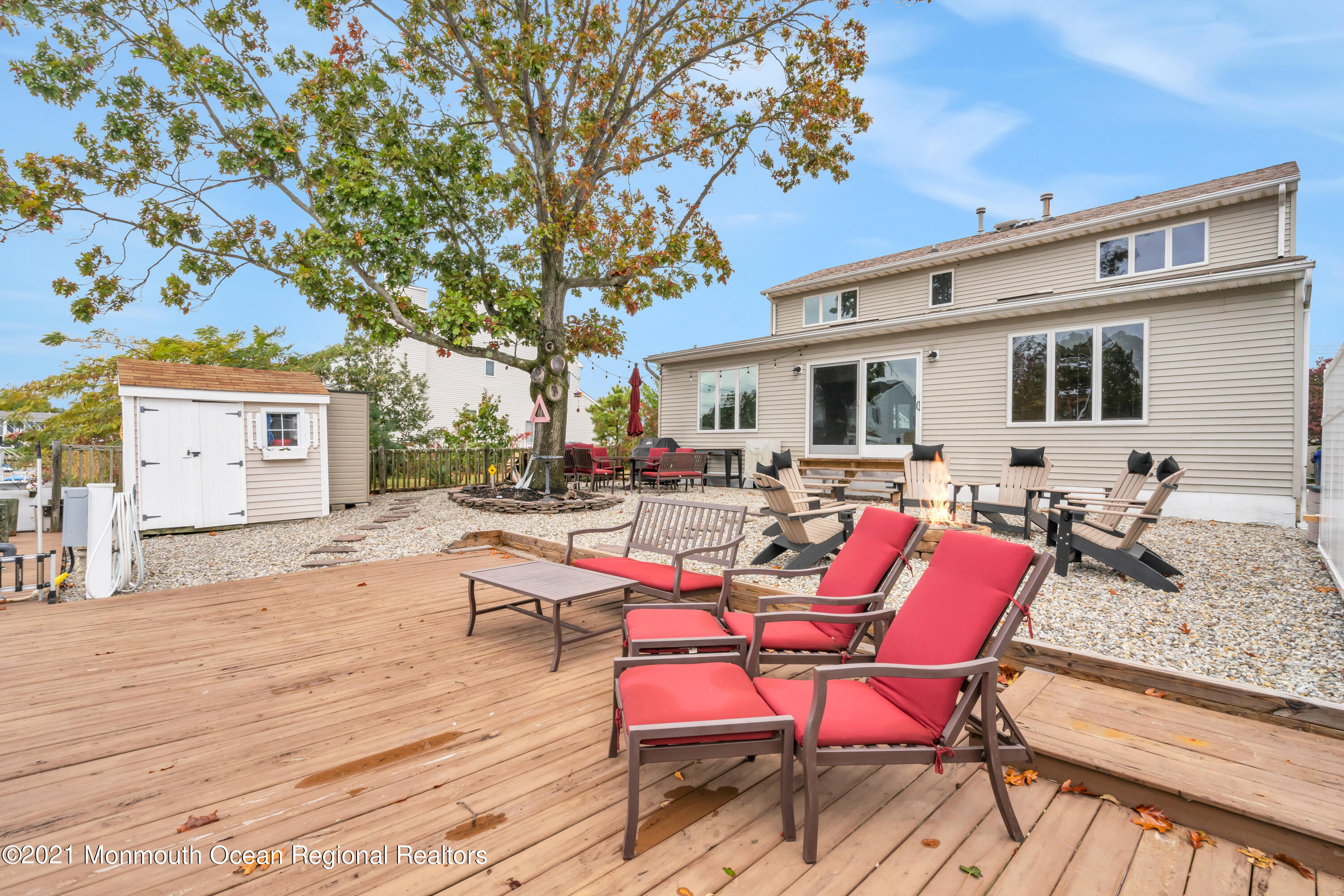 38 Topsail Road Brick, NJ 08723 - Photo 3 of 57 a view of a dinning table and chairs in the patio