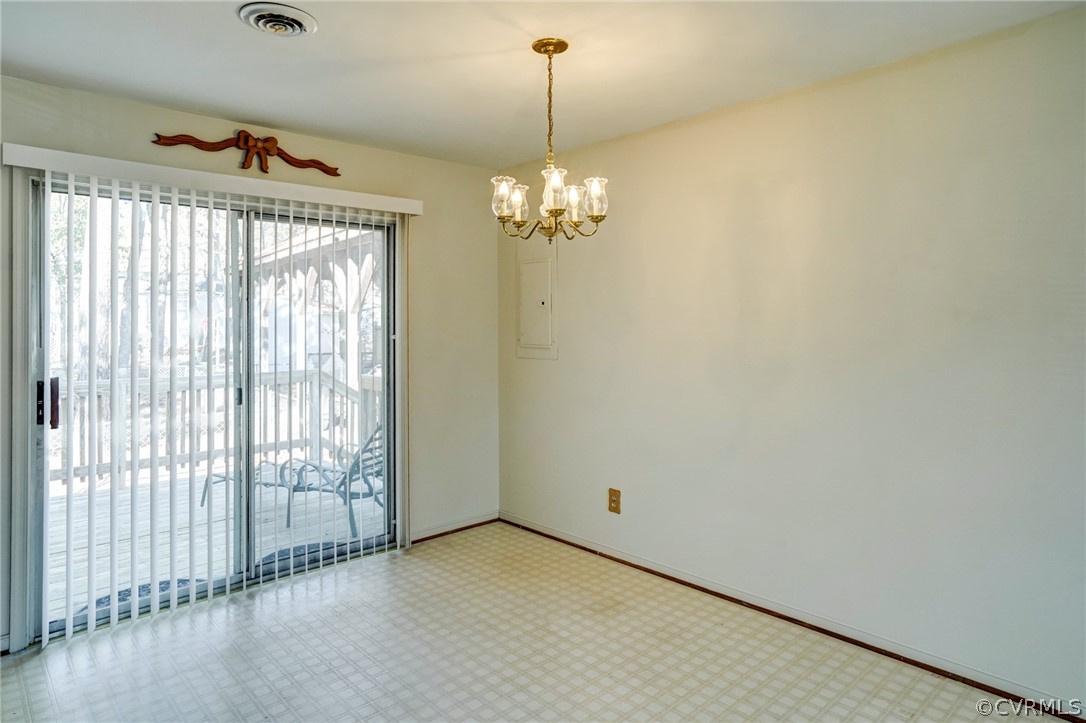 5506 Linda Road Sandston, VA 23150 - Photo 15 of 44 Eat In Kitchen Area with Sliding Door to Rear Deck - Very Bright & Open!