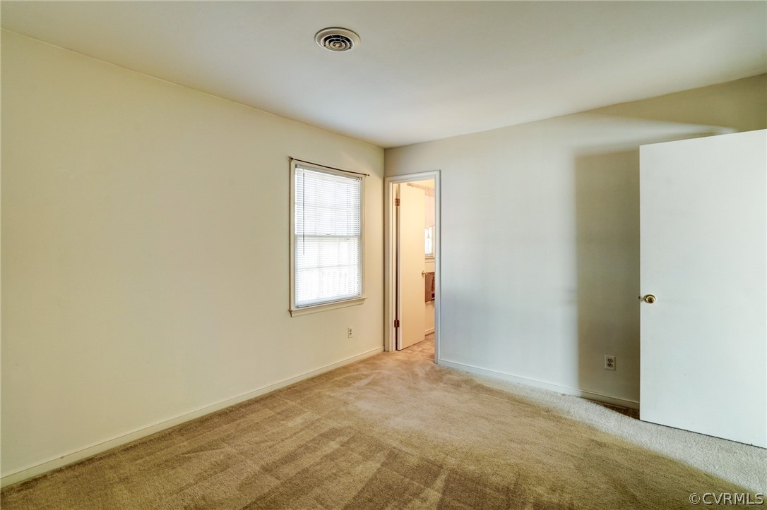 5506 Linda Road Sandston, VA 23150 - Photo 24 of 44 Large 11 x 13 Primary Bedroom, Carpets Freshly Cleaned & Fresh Paint throughout!