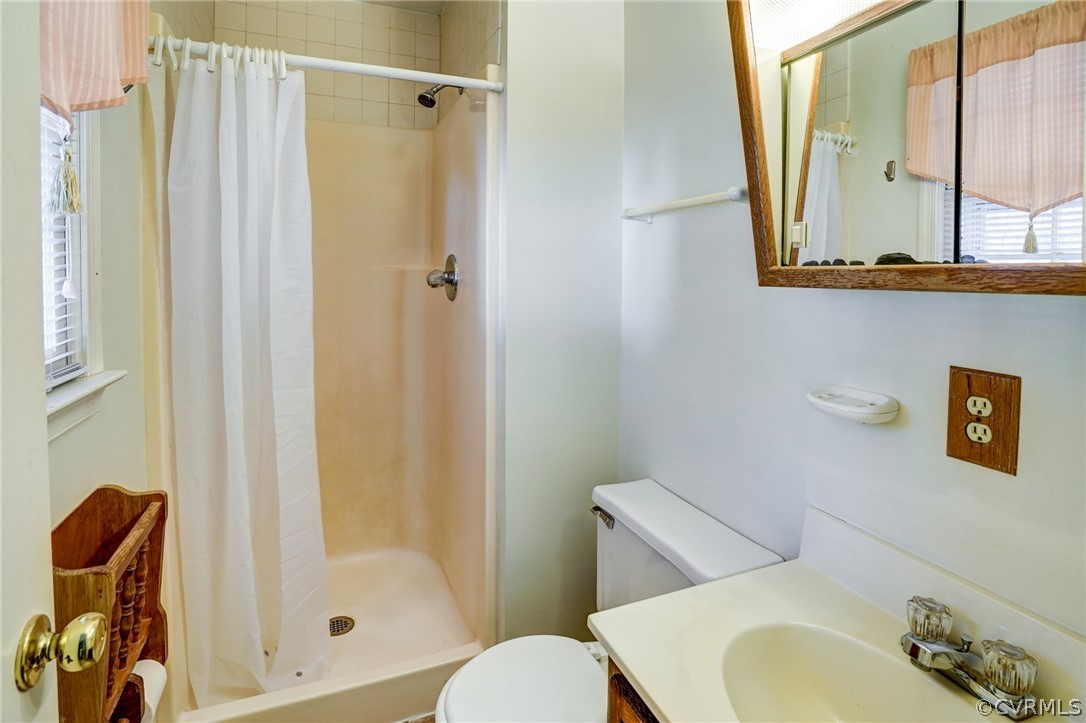 5506 Linda Road Sandston, VA 23150 - Photo 27 of 44 Primary Bedroom has Step-In Shower and Vanity for storage