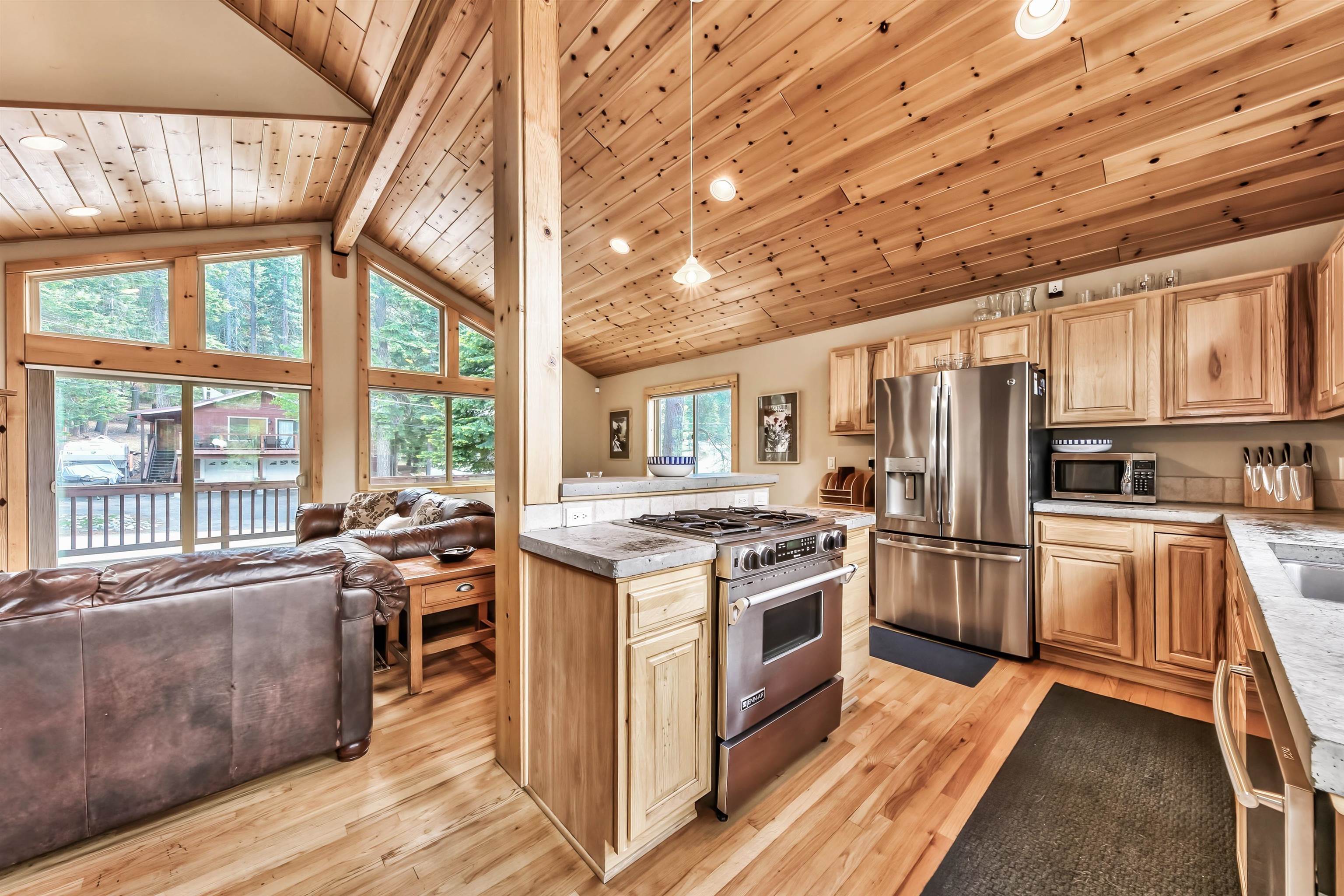 10488 Heather Road Truckee, CA 96161 - Photo 13 of 21 a kitchen with stainless steel appliances granite countertop a stove and a refrigerator
