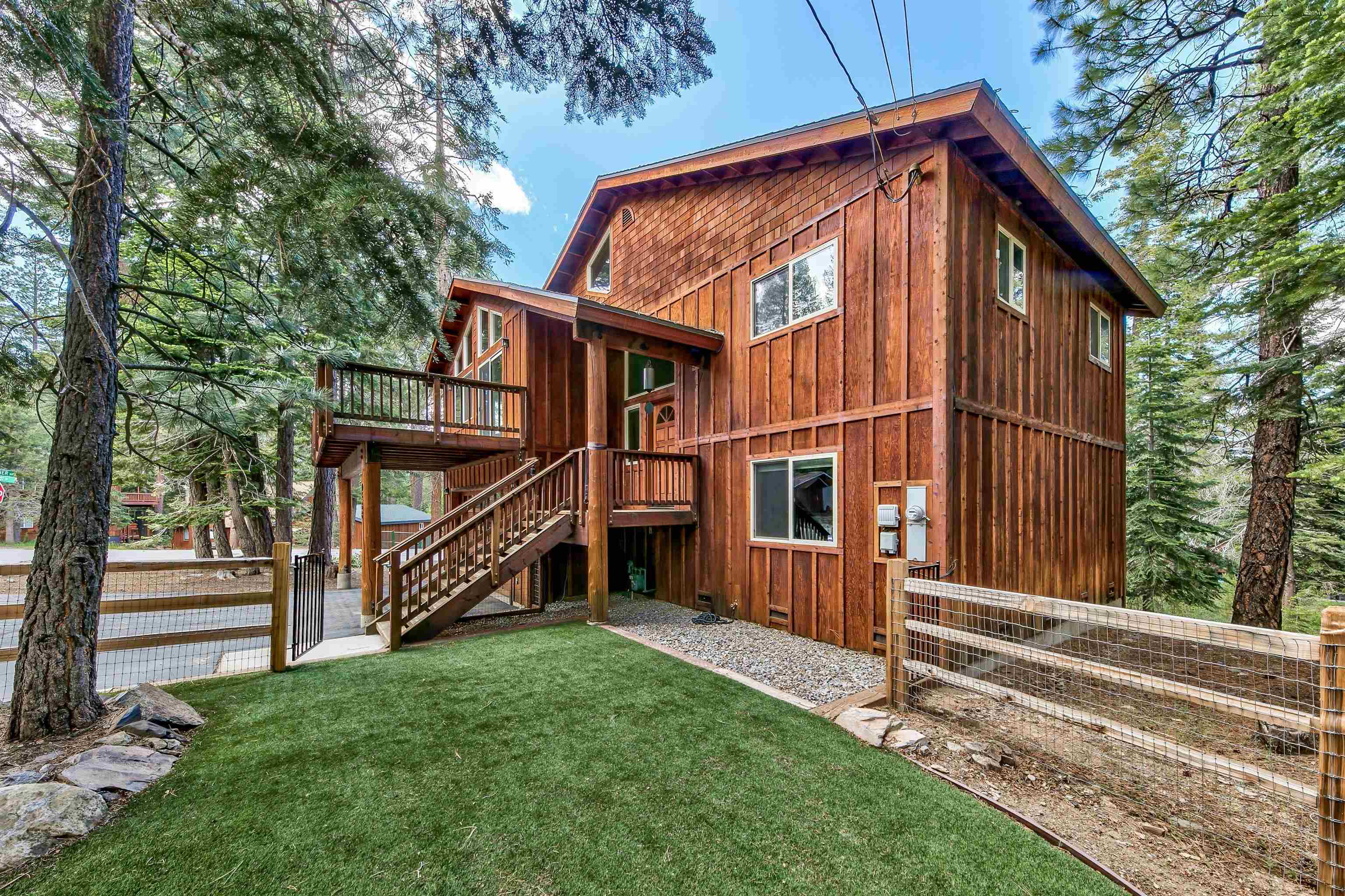 10488 Heather Road Truckee, CA 96161 - Photo 2 of 21 a view of a house with a yard and stairs