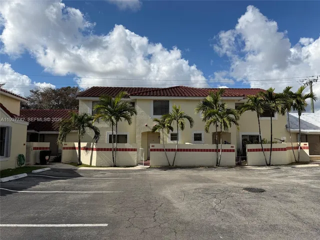 a view of a swimming pool and a yard