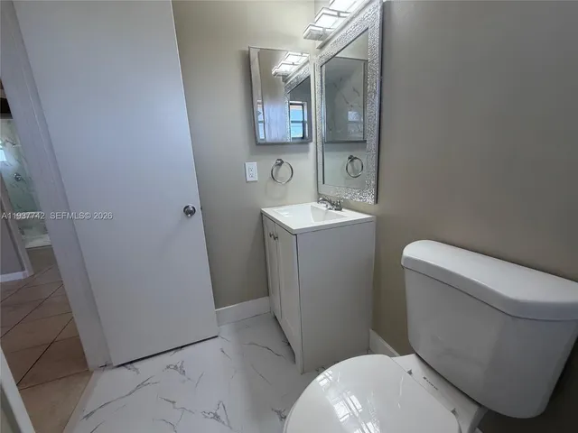 a view of hallway with windows