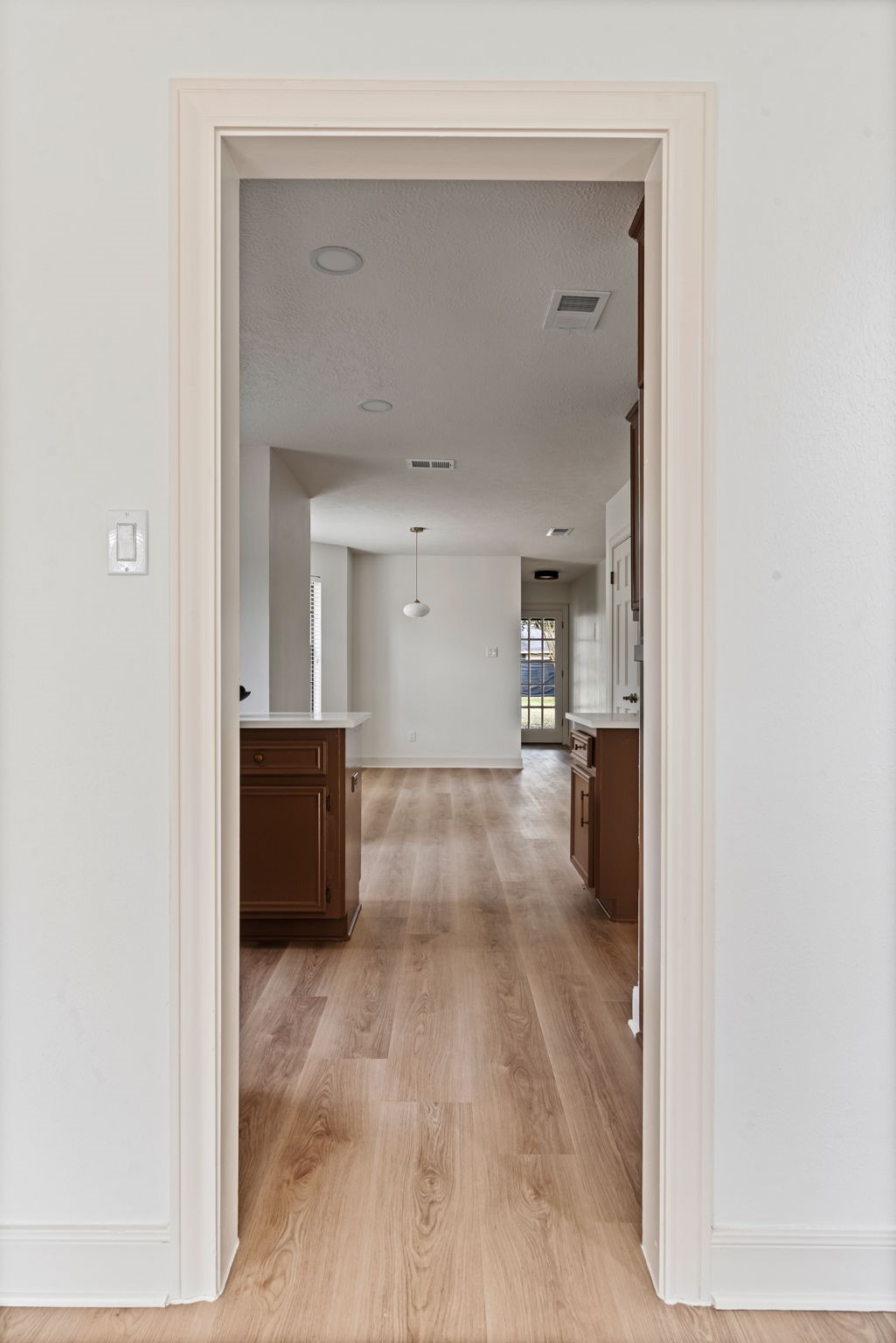 623 Cotter Drive Spring, TX 77373 - Photo 8 of 37 Looking from the formal dining room into the kitchen