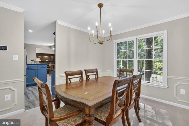 a kitchen with a stove a sink and a microwave