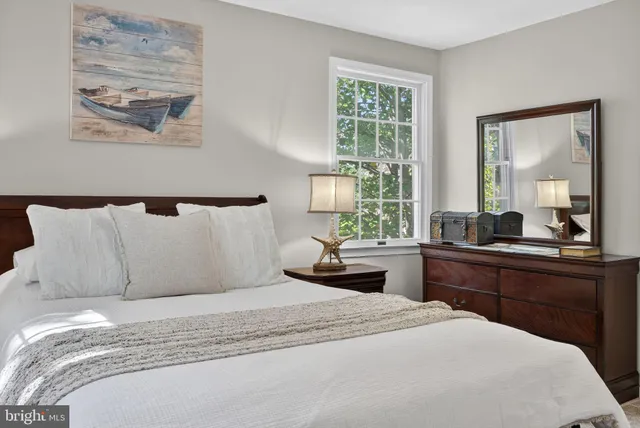 a view of two chairs in the balcony