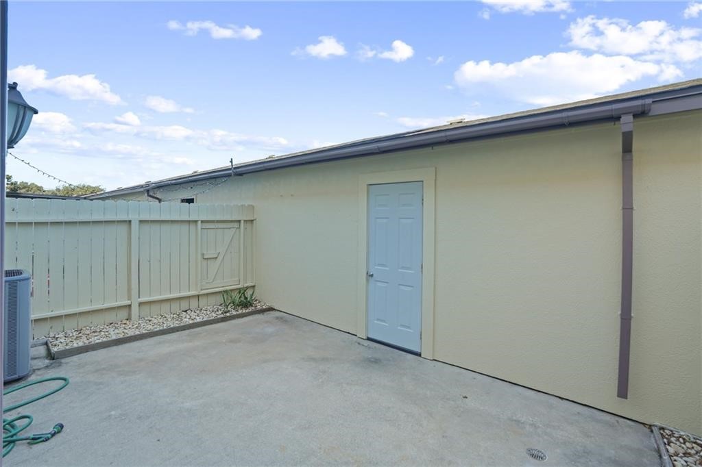 2713 St Joseph Street Corpus Christi, TX 78418 - Photo 15 of 17 an empty room with a ceiling fan
