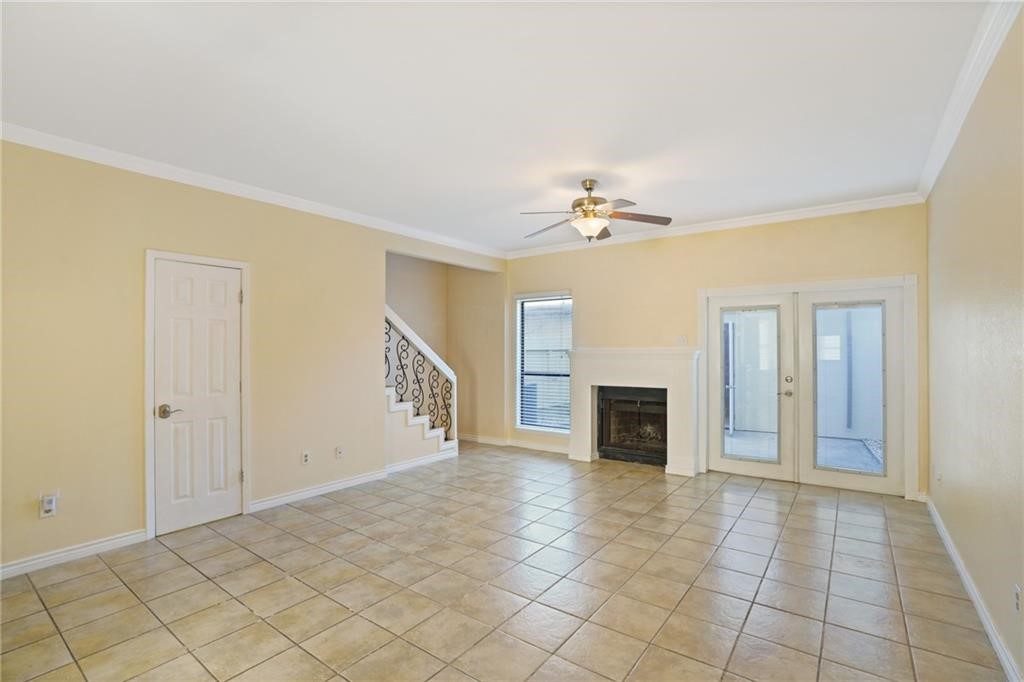 2713 St Joseph Street Corpus Christi, TX 78418 - Photo 3 of 17 a view of a livingroom with an empty space and a fireplace