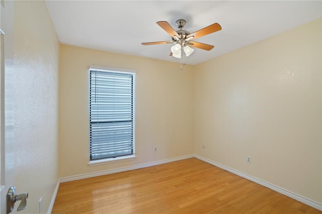 2713 St Joseph Street Corpus Christi, TX 78418 - Photo 9 of 17 a view of a big room with a ceiling fan