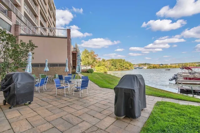a view of a chairs and table in the garden