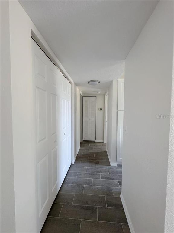 1013 South Hiawassee Road, Unit 3635 Orlando, FL 32835 - Photo 9 of 18 a view of gallery with wooden floor