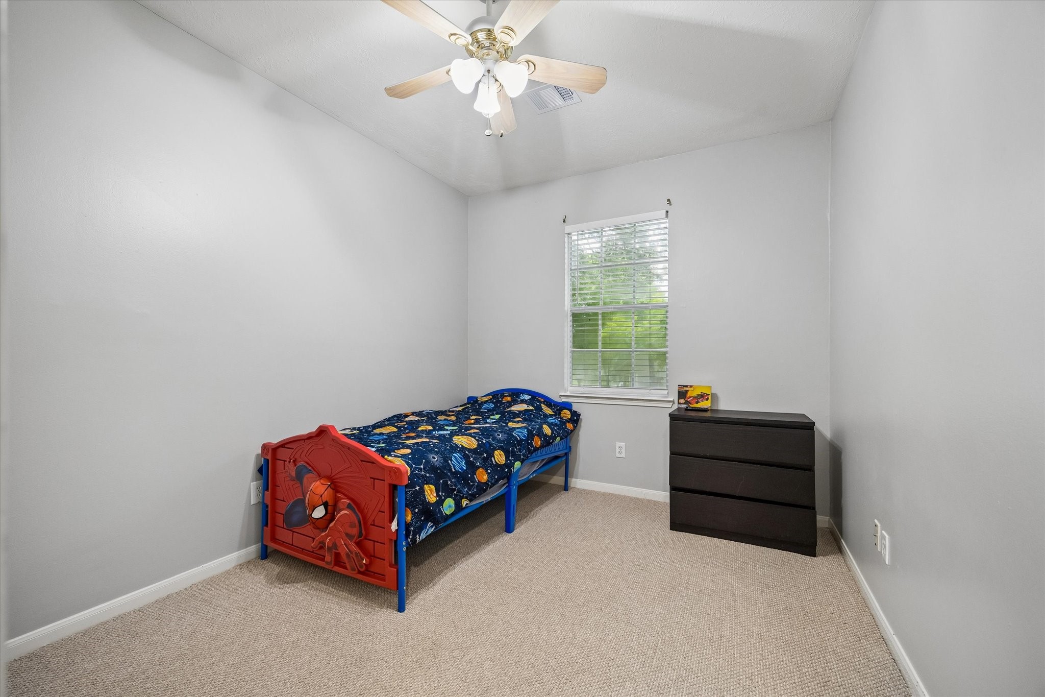 8123 Clarion Way Houston, TX 77040 - Photo 24 of 33 a bedroom with bed and window