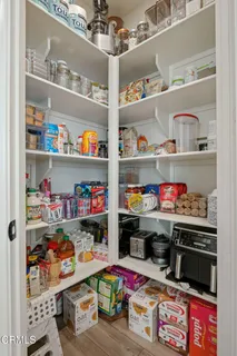 a store room with lots of different colored cloths