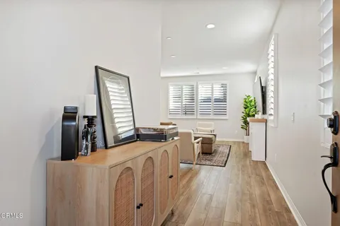 a view of a living room and dining room