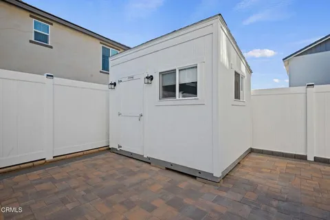 a workspace with furniture and a window