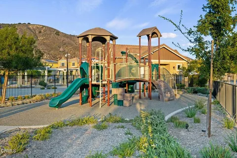 a view of a house with a park