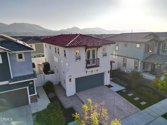 an aerial view of a house with a garden view