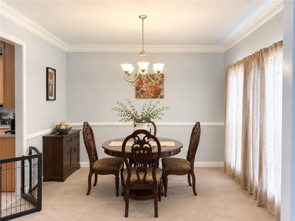 3776 Mason Ridge Drive Winston, GA 30187 - Photo 11 of 48 a view of a dining room with furniture and window