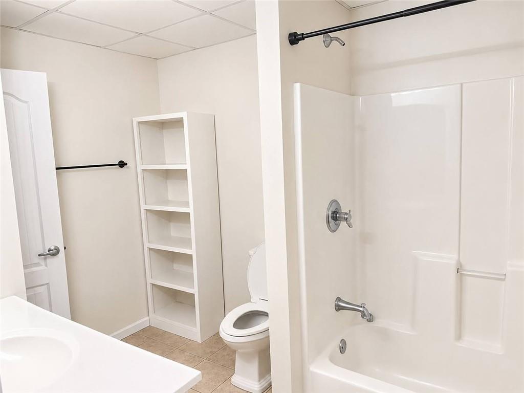3776 Mason Ridge Drive Winston, GA 30187 - Photo 25 of 48 a bathroom with a shower a bathtub and a shower