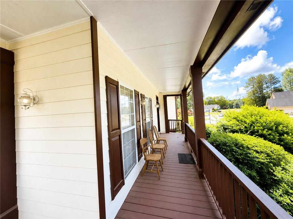 3776 Mason Ridge Drive Winston, GA 30187 - Photo 4 of 48 a view of a balcony with wooden floor