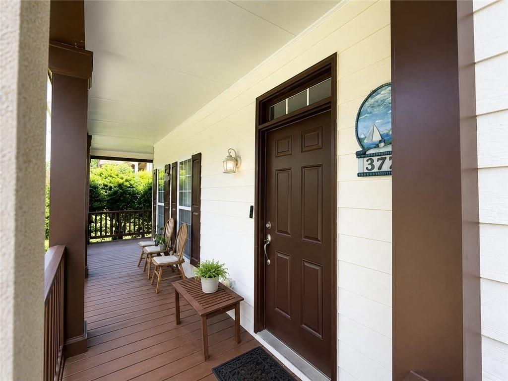 3776 Mason Ridge Drive Winston, GA 30187 - Photo 5 of 48 a view of a porch with wooden floor and chair