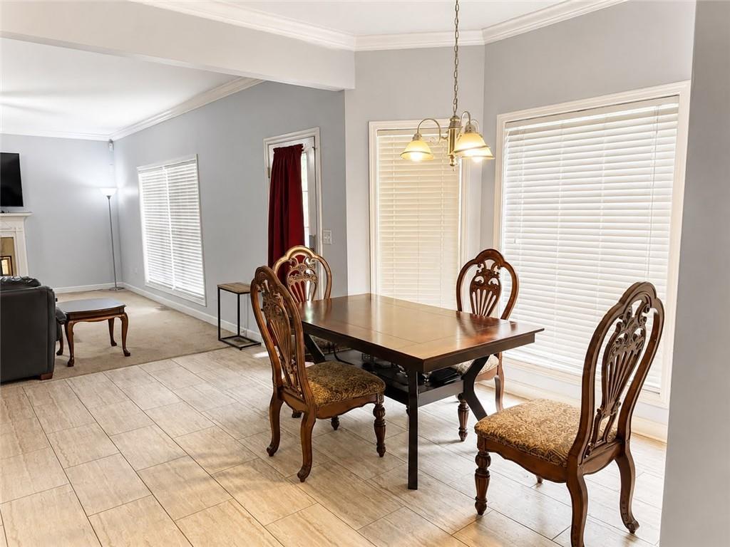 3776 Mason Ridge Drive Winston, GA 30187 - Photo 10 of 48 a view of a dining room with furniture and window