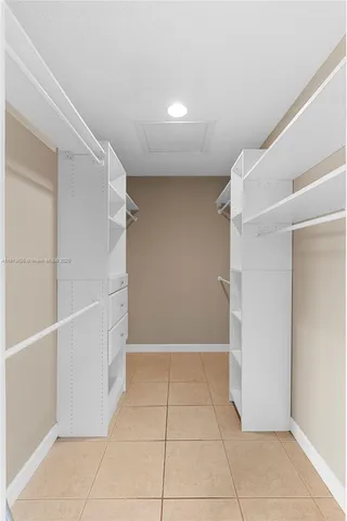 a view of an empty walk in closet