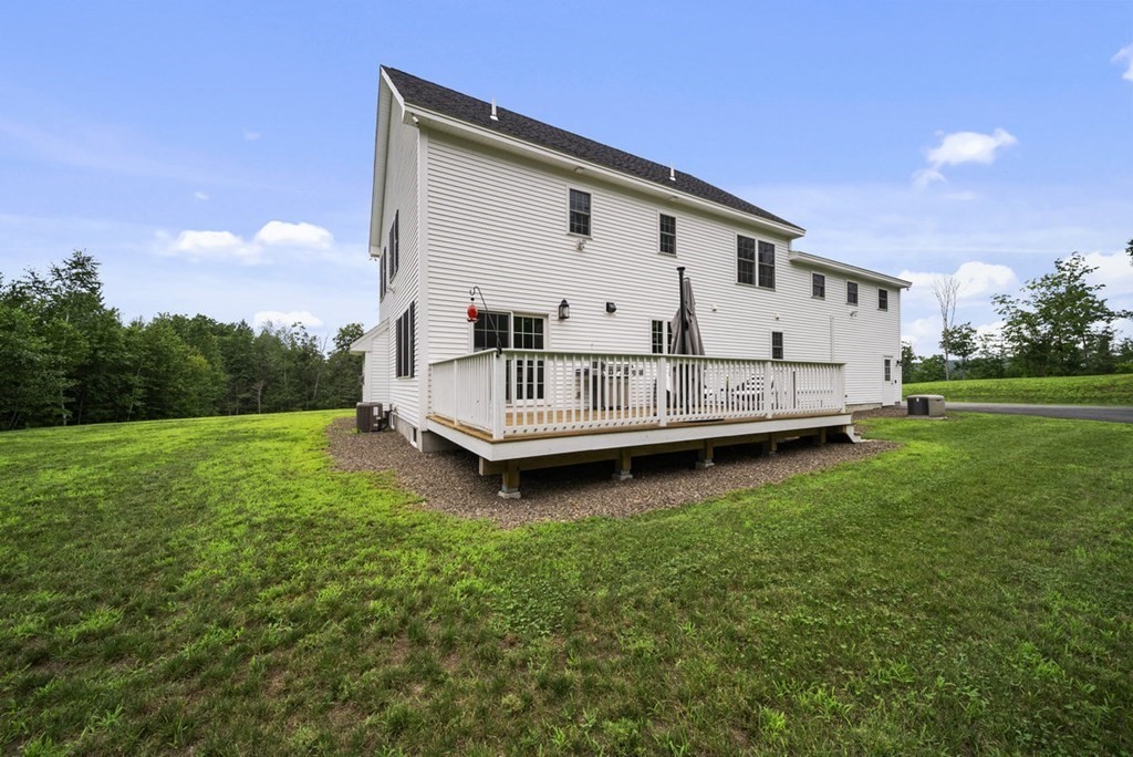 7 Kennard Road Epping, NH 03042 - Photo 33 of 42 a view of a house with a yard