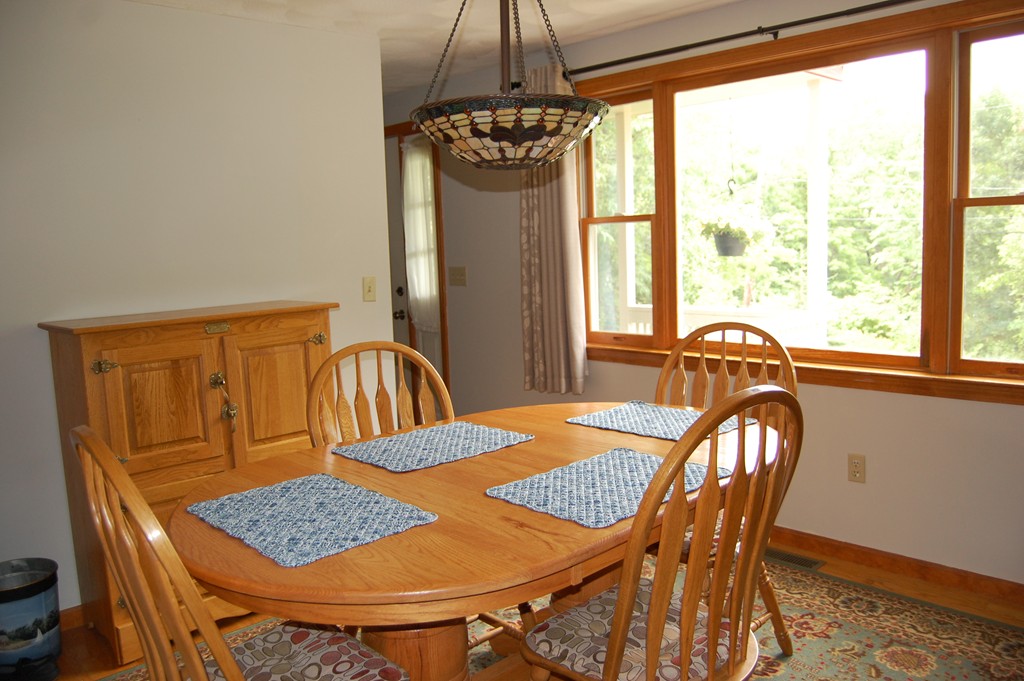81 Old Ferry Road Haverhill, MA 01830 - Photo 8 of 17 a view of a dining room with furniture window and outside view