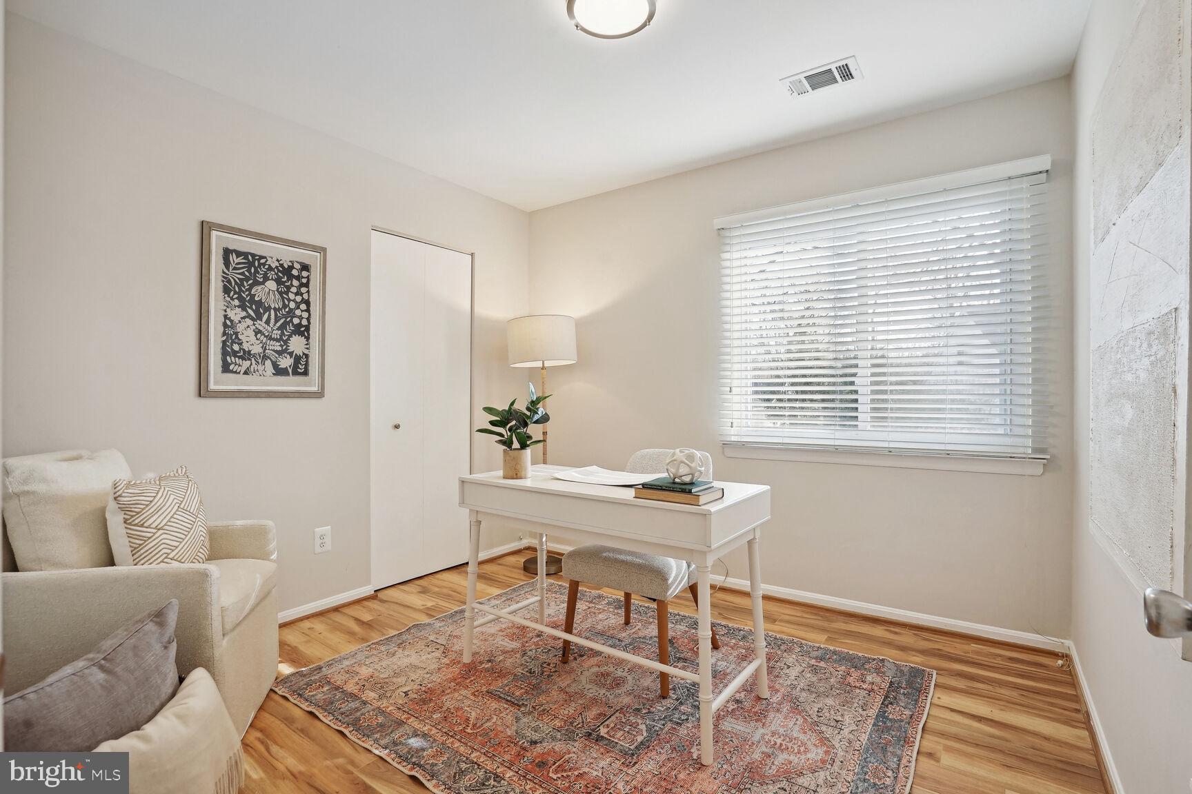 11408 Turnmill Lane Reston, VA 20191 - Photo 9 of 17 a workspace with furniture and a window