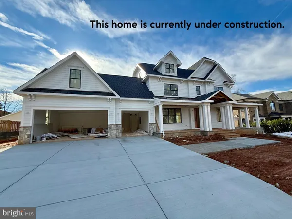 a front view of a house with yard