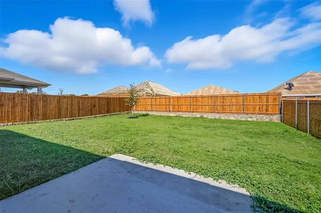 a view of a garden with a big yard