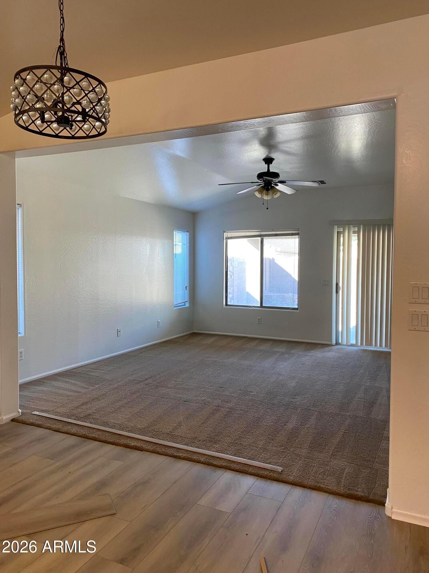 9124 West Heber Road Tolleson, AZ 85353 - Photo 11 of 26 a view of an empty room and window