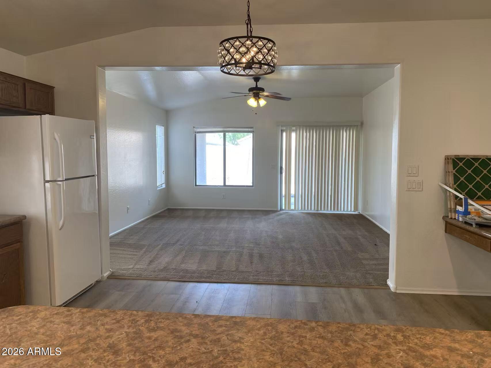 9124 West Heber Road Tolleson, AZ 85353 - Photo 12 of 26 a view of a livingroom with a window