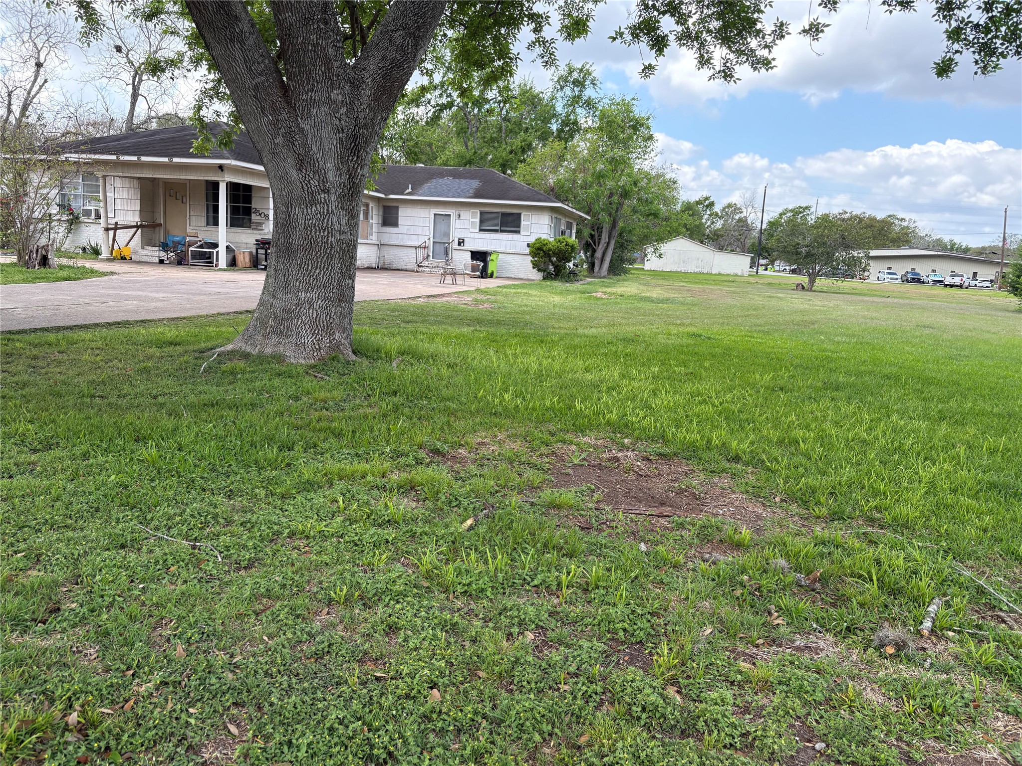 2508 4th Street Rosenberg, TX 77471 - Photo 5 of 13 a front view of house with yard and trees