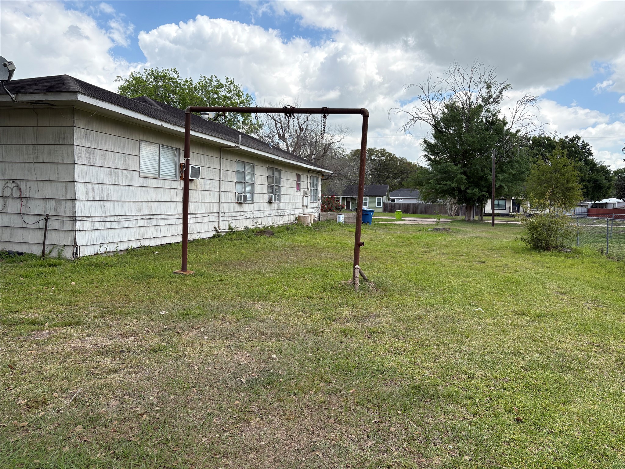 2508 4th Street Rosenberg, TX 77471 - Photo 10 of 13 a backyard of a house with lots of green space