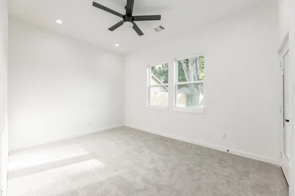 an empty room with windows