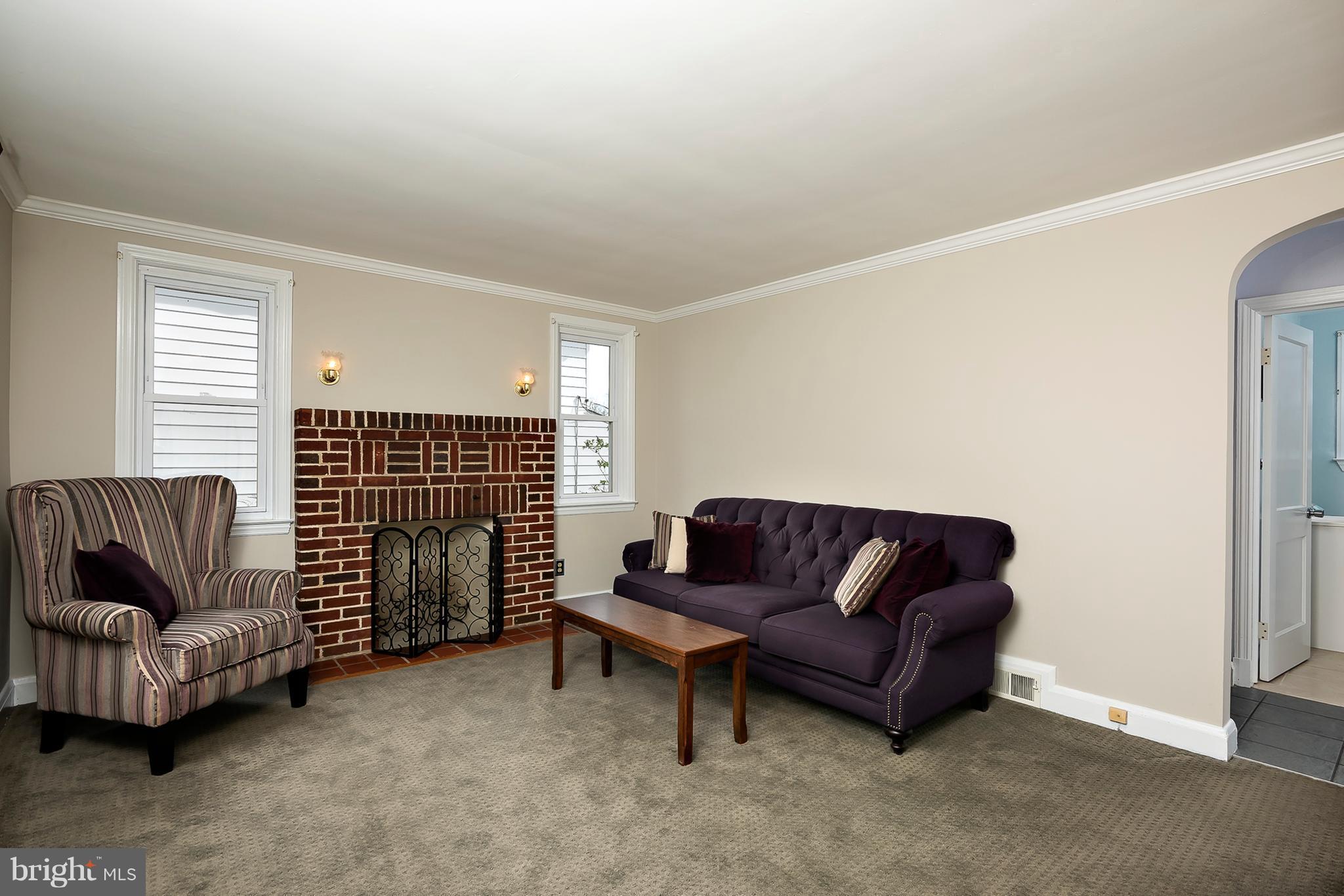 618 Coleraine Road Baltimore, MD 21229 - Photo 5 of 27 a living room with furniture and a couch