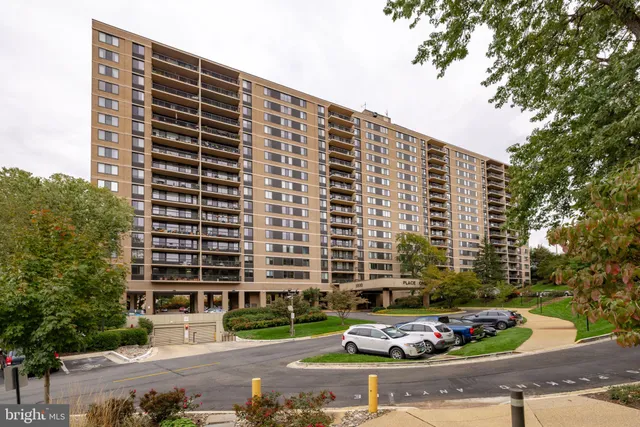 a front view of a building with street view
