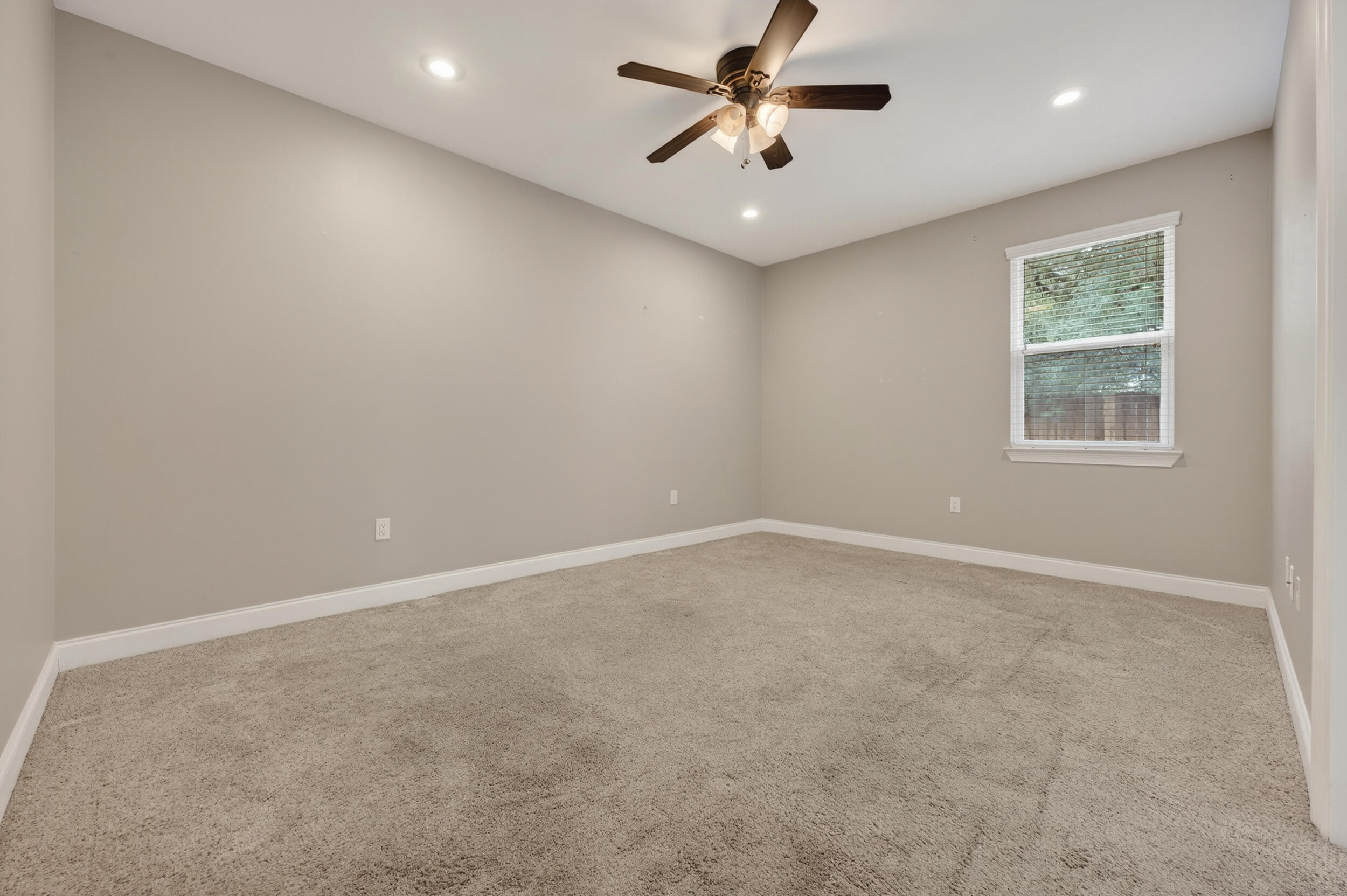 106 Arrowhead Way Niceville, FL 32578 - Photo 17 of 39 an empty room with a empty space and windows