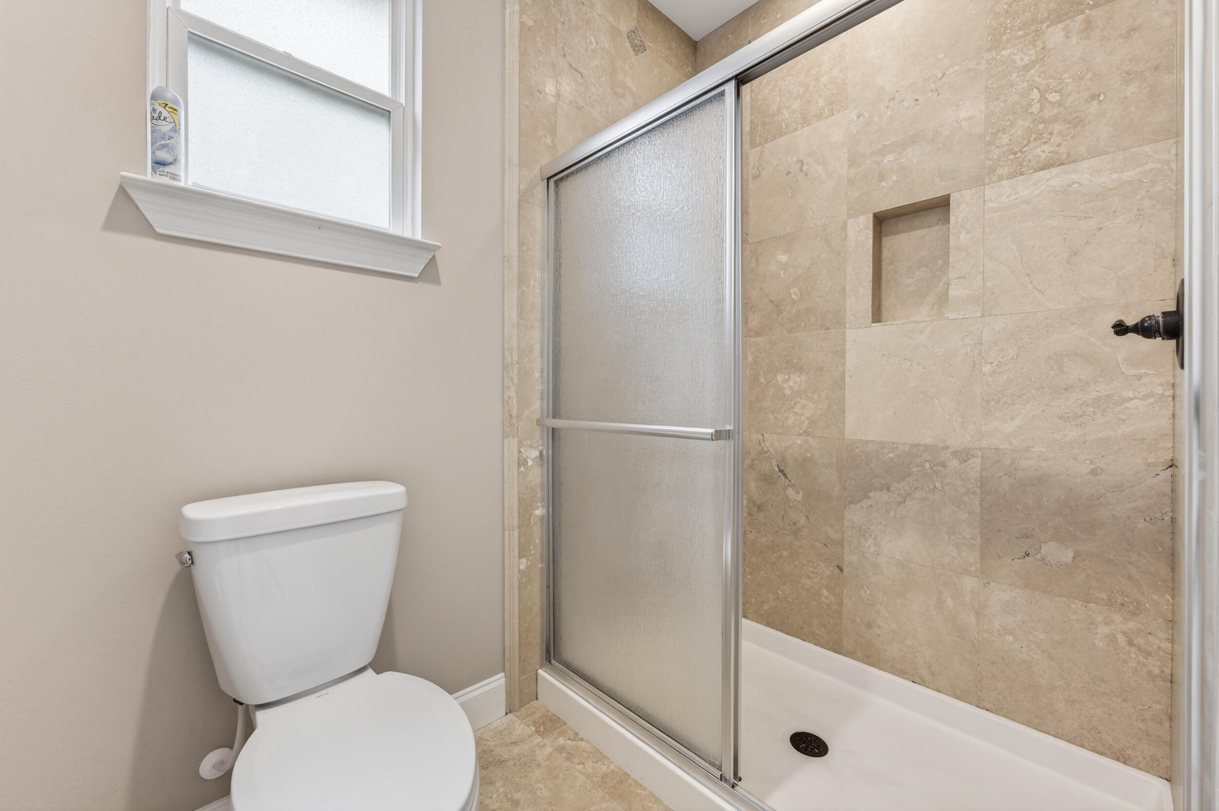106 Arrowhead Way Niceville, FL 32578 - Photo 22 of 39 a bathroom with a toilet and a shower