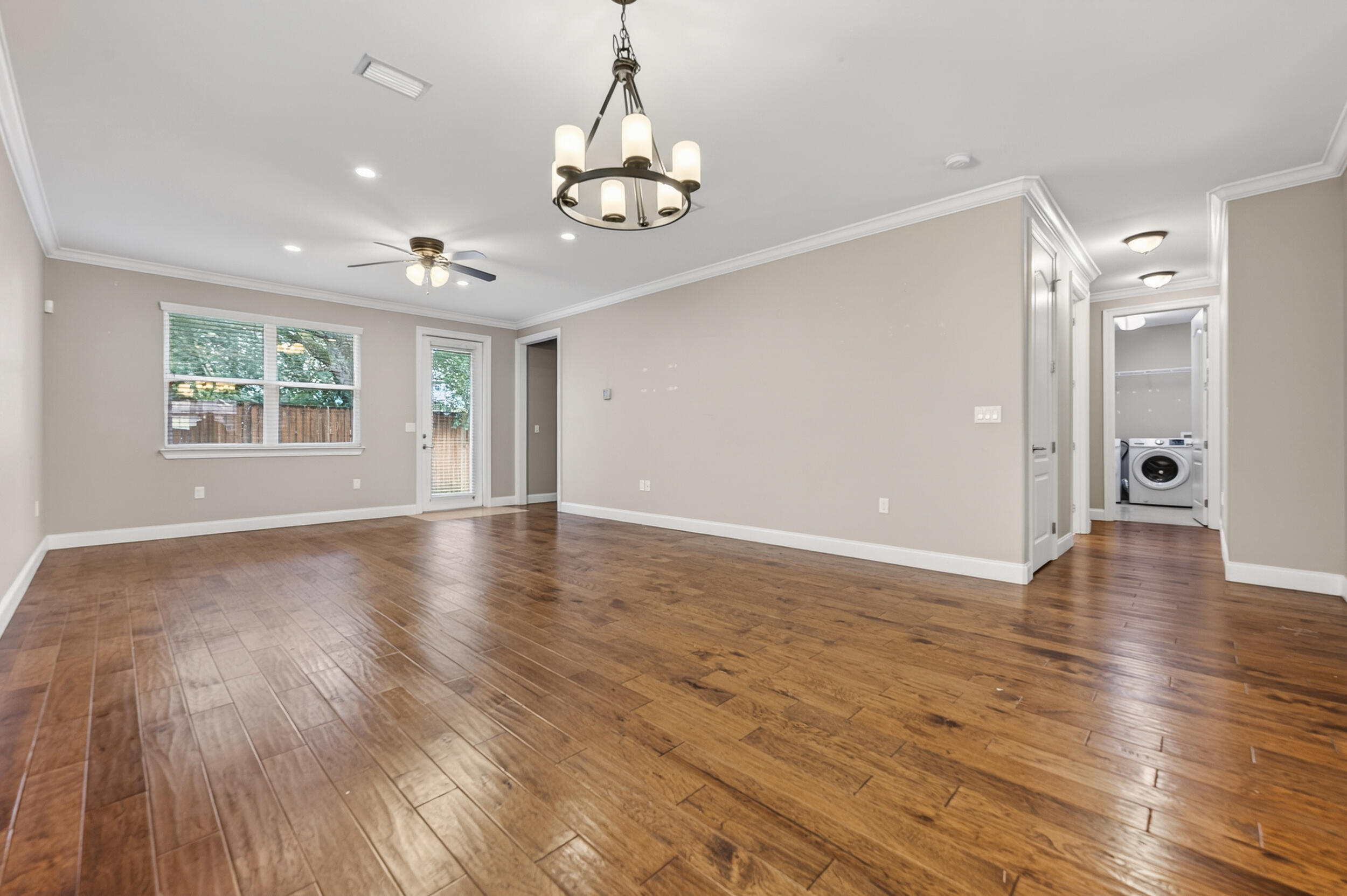 106 Arrowhead Way Niceville, FL 32578 - Photo 9 of 39 an empty room with wooden floor and windows