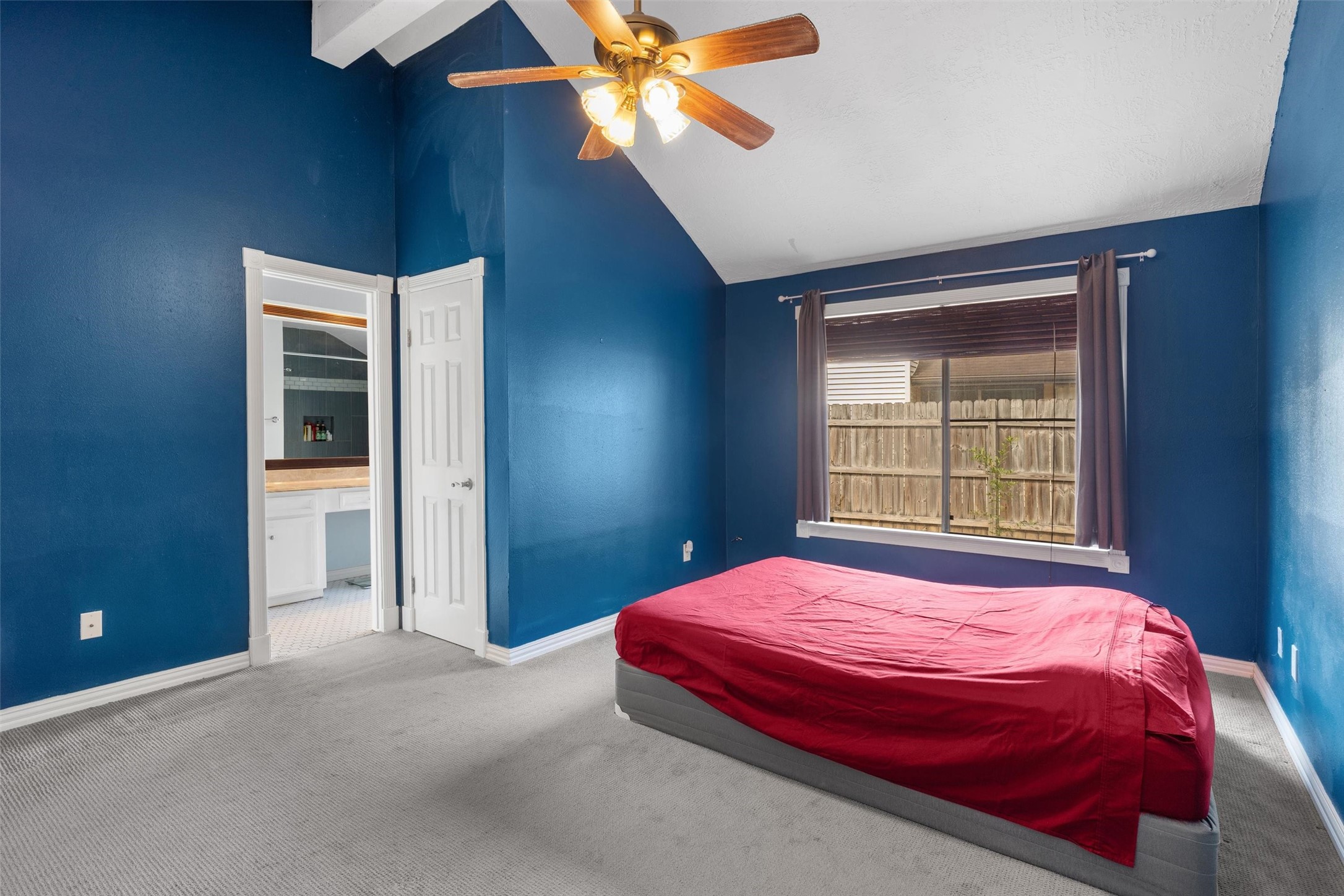 1719 Sullins Way Houston, TX 77058 - Photo 14 of 27 a bedroom with a bed and a window