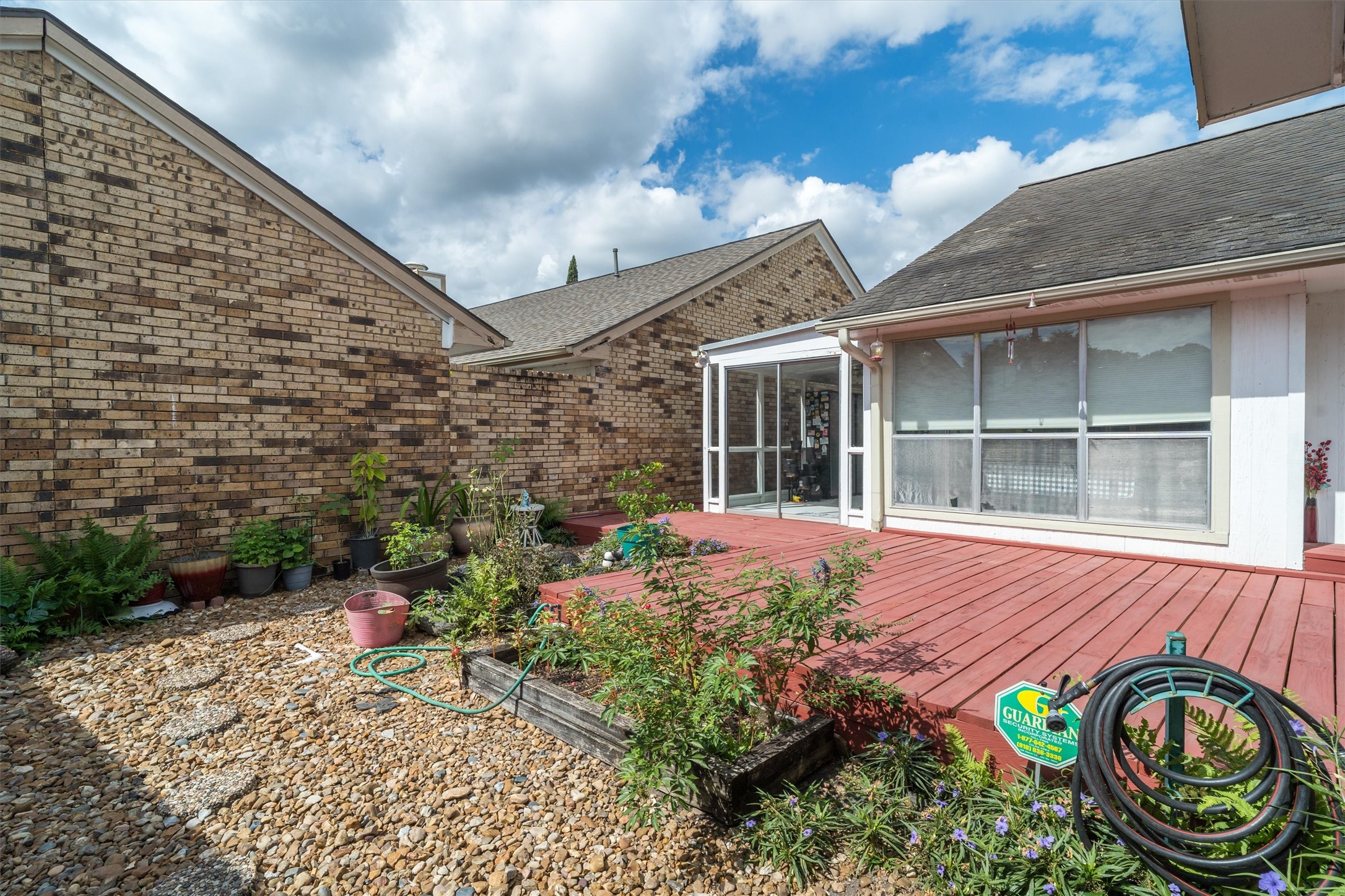 1719 Sullins Way Houston, TX 77058 - Photo 21 of 27 a front view of a house with a yard