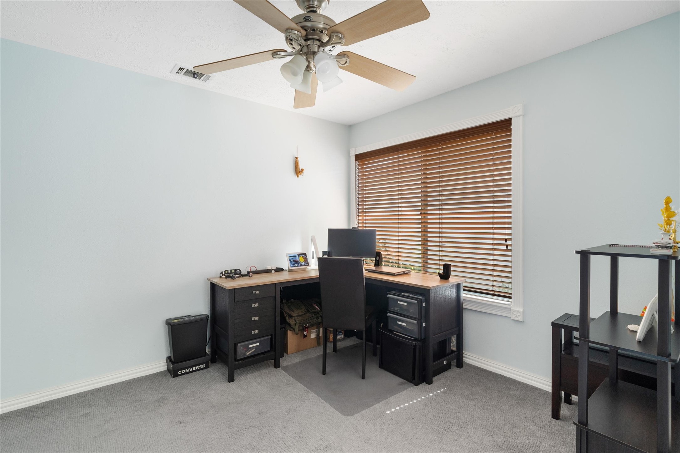 1719 Sullins Way Houston, TX 77058 - Photo 4 of 27 a view of a workspace with furniture