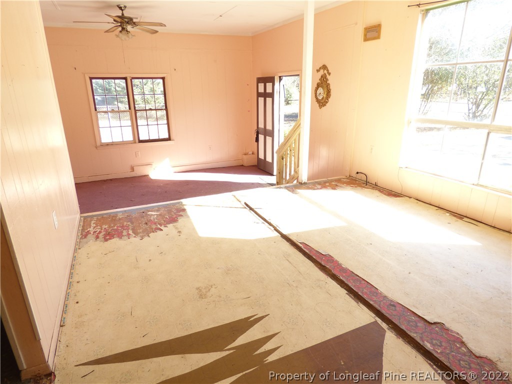 6690 Turnpike Road Raeford, NC 28376 - Photo 5 of 12 a view of a bedroom with a window