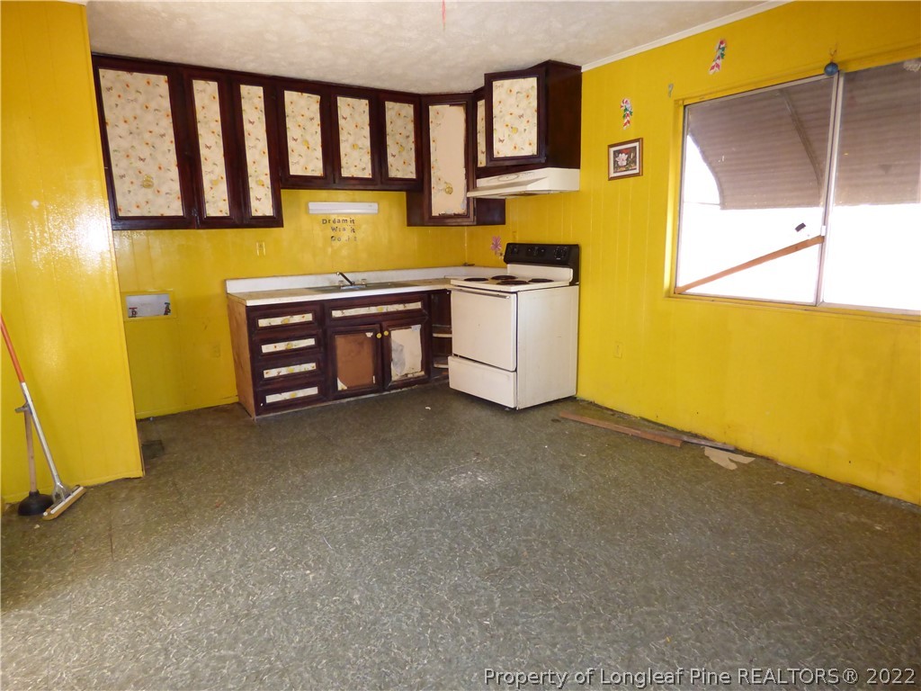 6690 Turnpike Road Raeford, NC 28376 - Photo 6 of 12 a view of an empty room