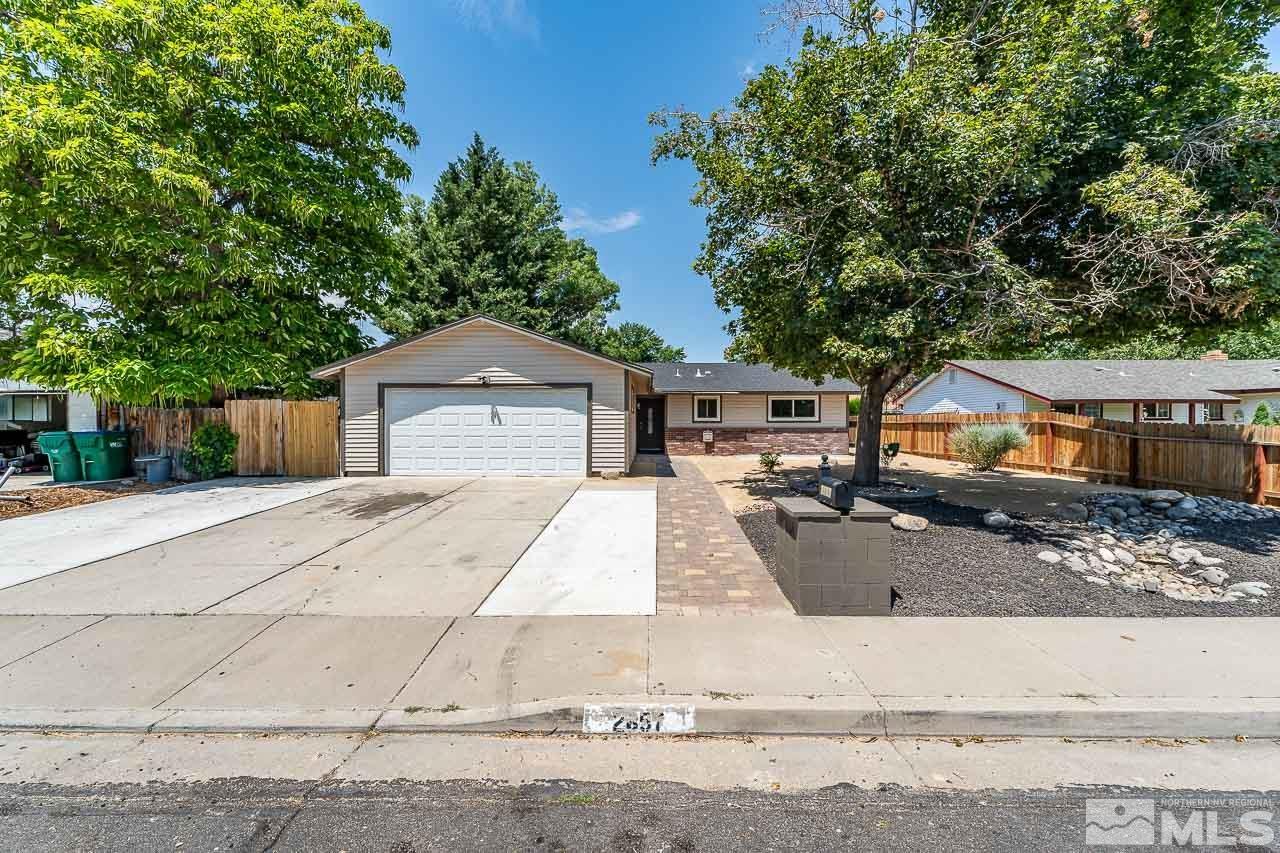 2857 Jake Street Reno, NV 89502 - Photo 1 of 22 front view of a house with a yard